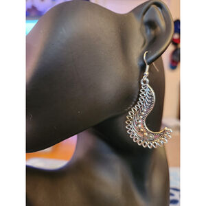 Silver toned cresent moon dangle earrings